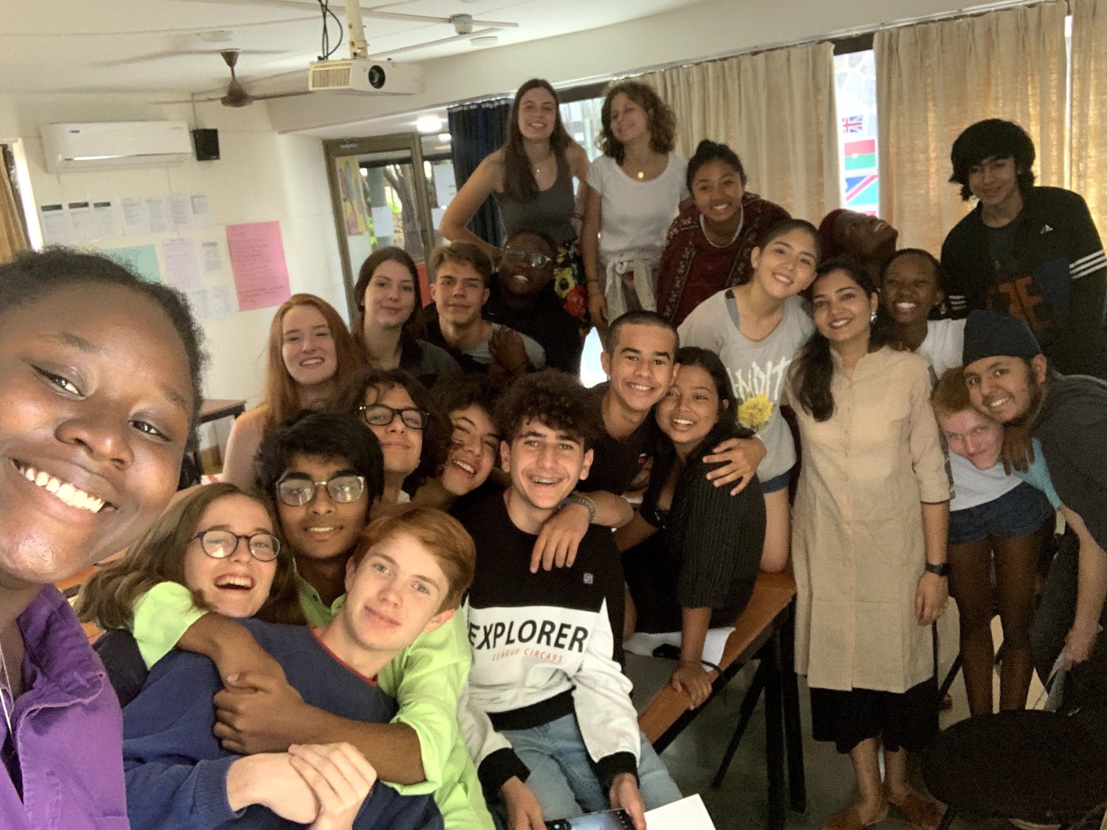 A class selfie — around twenty Global Politics students crowded into the frame, laughing